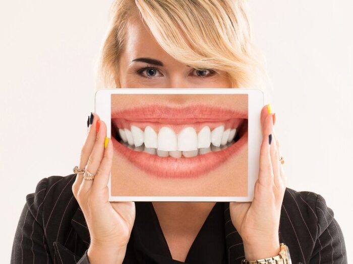 woman-holding-tablet_144627-597